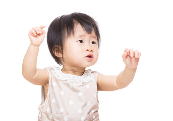 Asian baby girl two hands up