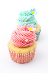 Vanilla cupcakes isolated white background