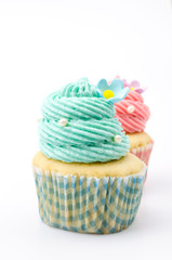 Vanilla cupcakes isolated white background