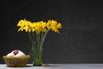 Happy Easter - Daffodil in a Glass with Eggs and a little Gift