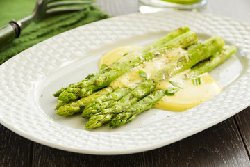 Grilled asparagus with hollandaise sauce.