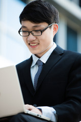 young businessman working outside