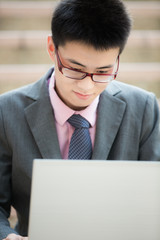 young businessman working outside