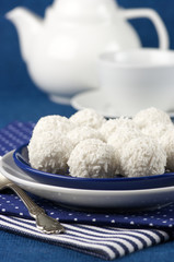 Coconut candies and tea