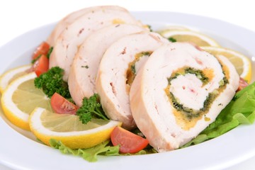 Delicious chicken roll on plate close-up