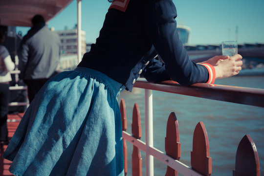 Woman relaxing on boat on the Thames