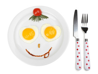 Scrambled eggs with bread on plate, on color napkin