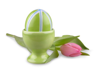 Green Easter eggs with pink tulip, isolated