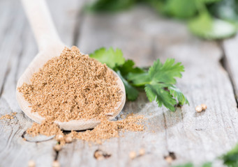 Coriander Powder on a wooden spoon