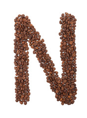 Alphabet from coffee beans isolated on white