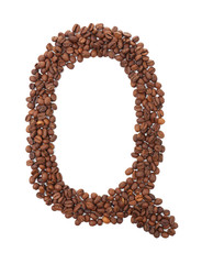 Alphabet from coffee beans isolated on white