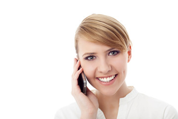 Closeup of young businesswoman talking on cellphone