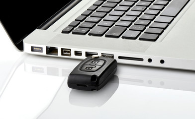 Start a laptop with a car key. lock, unlock