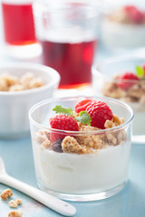 healthy breakfast with yogurt granola and raspberry