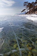Baikal Lake. The stones on the bottom through the ice