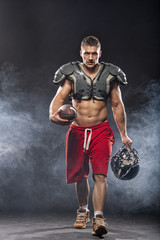 Fototapeta na wymiar American football player posing