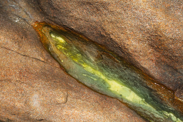 opal waterponds on granite rocks