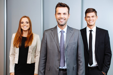 Three happy business people