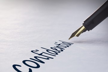 Fountain pen writing Confidential