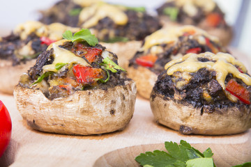 Stuffed champignons with eggs, cheese and paprika.