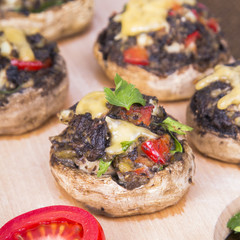 Stuffed champignons with eggs, cheese and paprika.