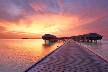Obraz na płótnie Canvas Sunset at Maldivian beach