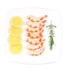 Cooked unshelled shrimps with lemon.