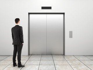 businessman and elevator © Who is Danny