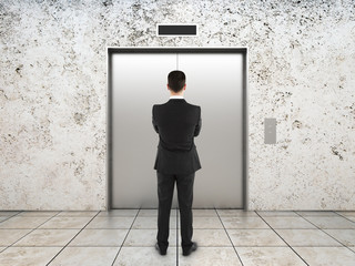 businessman and elevator © Who is Danny