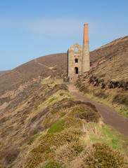 Coast path and Cornwall tin mine England UK