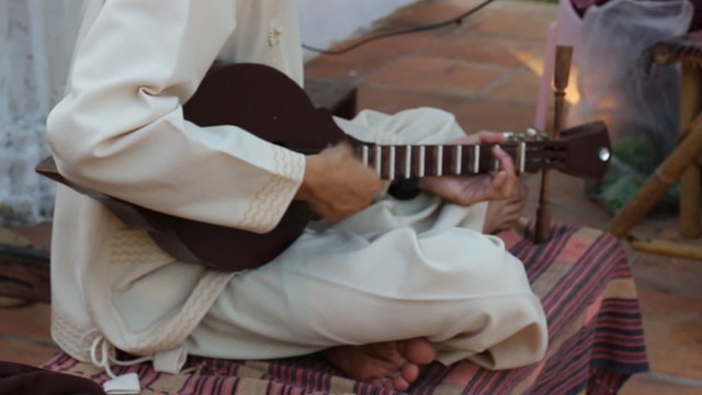 Guitar Player Playing Local Song Outdoor