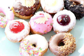 Many donuts in the dish.