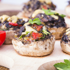 Stuffed champignons with eggs, cheese and paprika.