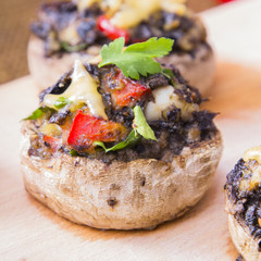Stuffed champignons with eggs, cheese and paprika.