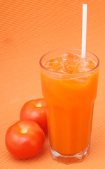 Tomatoes juice on background