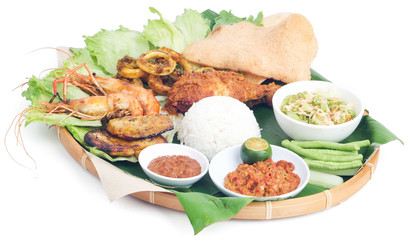 Indonesian traditional food, chicken, fish, vegetables