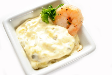 A Single Shrimp in Tartar Sauce