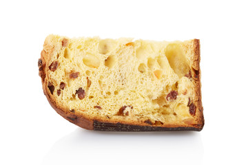 Panettone slice isolated on white, clipping path - obrazy, fototapety, plakaty