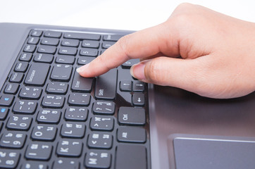 Closeup woman hand touch enter key