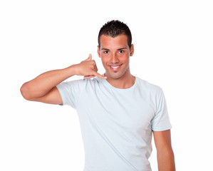 Latin guy standing with calling gesture