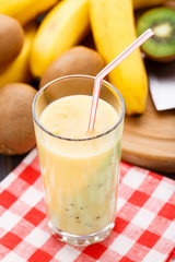 Glass of tropical fruit smoothie