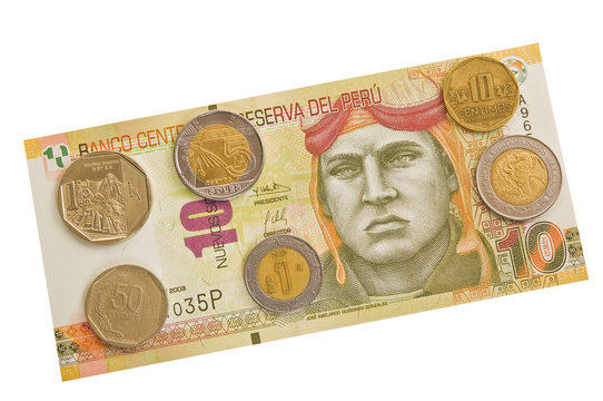 Peruvian banknotes and coins.