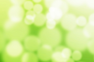 Fototapeta na wymiar green abstract background with bokeh defocused lights, Festive background.