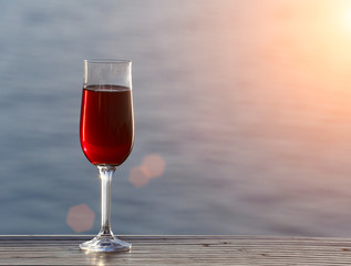Glass of wine at sea