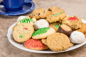 Plate of cookies with coffee mug