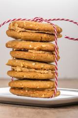 Stack of filled cookies tied with string
