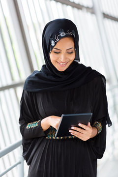 Middle Eastern Woman Using Tablet Computer