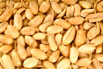 Peanuts. Processed peanuts on the background