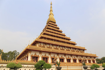 gold pagoda with blue sky