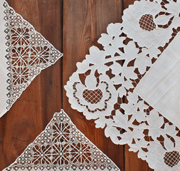 Beautiful vintage doily on a wooden background
